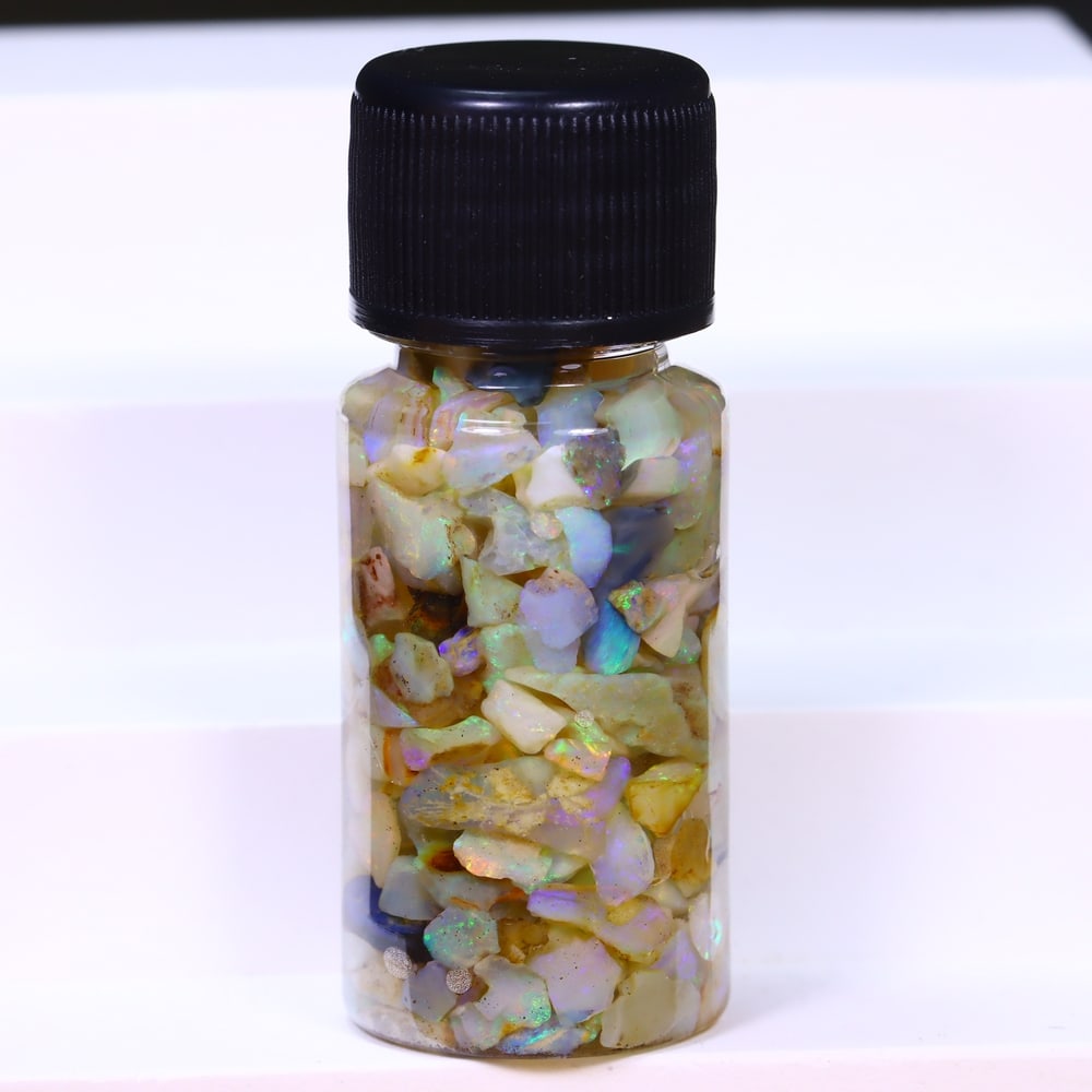 Australian Lightning Ridge Crystal Black Opal Rough Chip Jar (Good For Display): Ksmith Jewels Global Welcome to our auction house, today auction brought to you by Ksmith Jewels Global based in Penang, Malaysia specialize in all kinds of opal and color gemstone both in manufacturi
