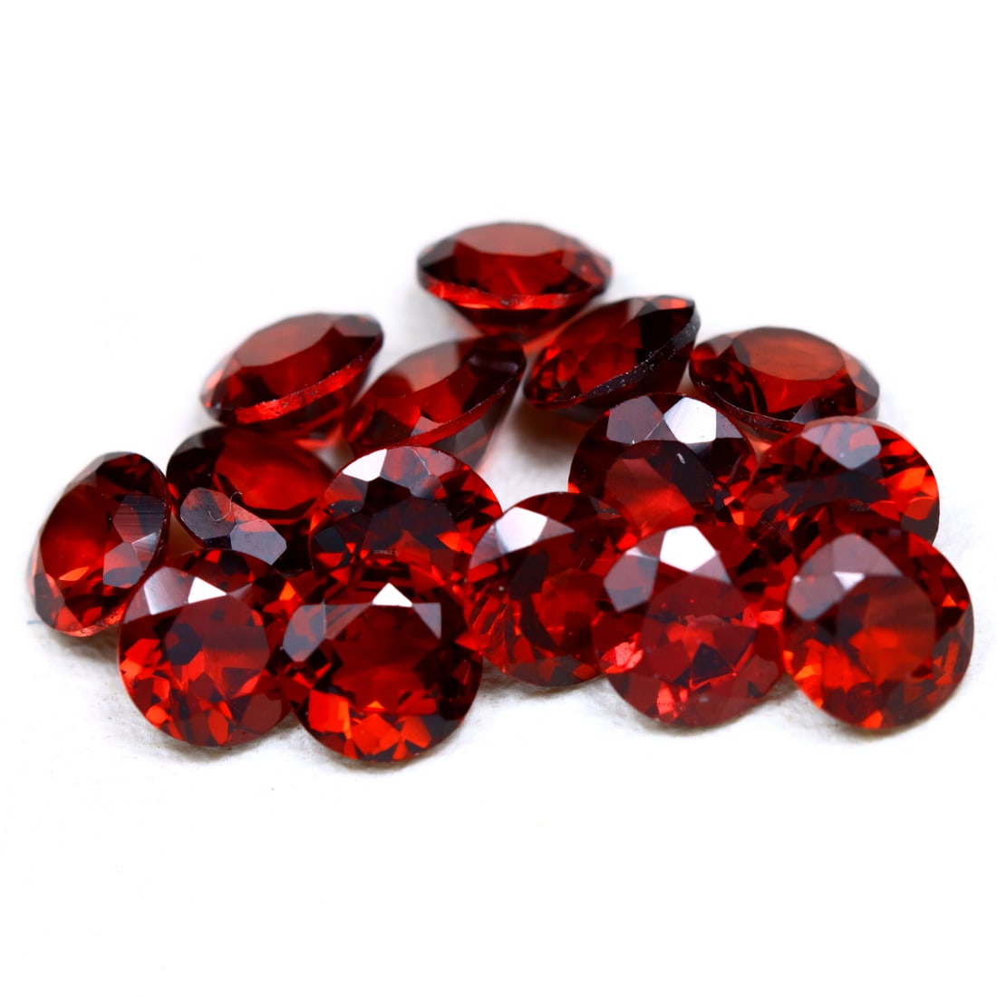 6.67Ct Natural Orange Red Garnet Lot Round Faceted in Lot: Ksmith Jewels Global Welcome to our auction house, today auction brought to you by Ksmith Jewels Global based in Penang, Malaysia specialize in all kinds of opal and color gemstone both in manufacturi
