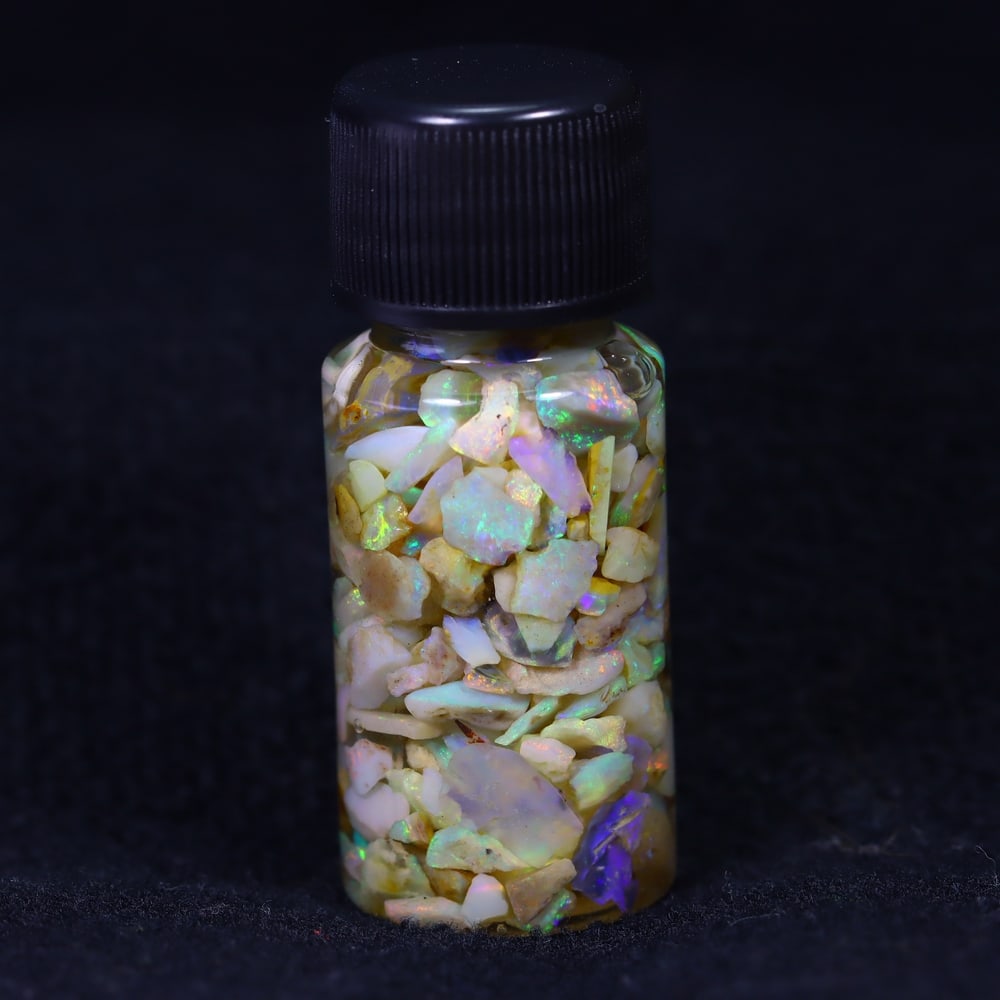 Australian Lightning Ridge Crystal Black Opal Rough Chip Jar (Good For Display): Ksmith Jewels Global Welcome to our auction house, today auction brought to you by Ksmith Jewels Global based in Penang, Malaysia specialize in all kinds of opal and color gemstone both in manufacturi