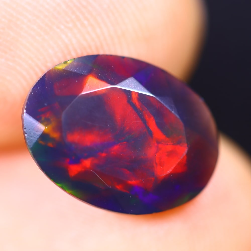 2.15Ct Welo Black Opal Polished - Ethiopian Opal - Oval Faceted: Ksmith Jewels Global Welcome to our auction house, today auction brought to you by Ksmith Jewels Global based in Penang, Malaysia specialize in all kinds of opal and color gemstone both in manufacturi