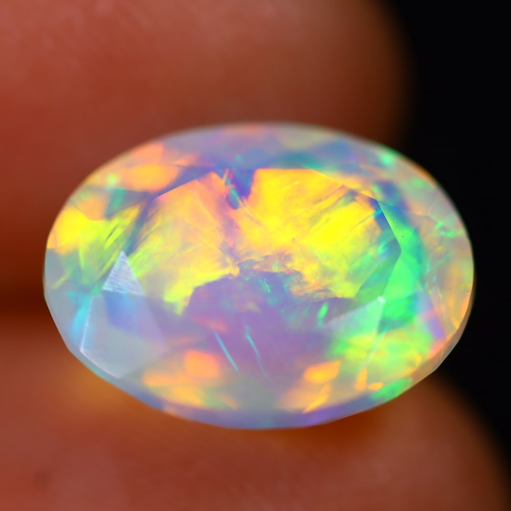 4.28Ct Welo Opal Polished - Ethiopian Opal - Oval Faceted: Ksmith Jewels Global Welcome to our auction house, today auction brought to you by Ksmith Jewels Global based in Penang, Malaysia specialize in all kinds of opal and color gemstone both in manufacturi