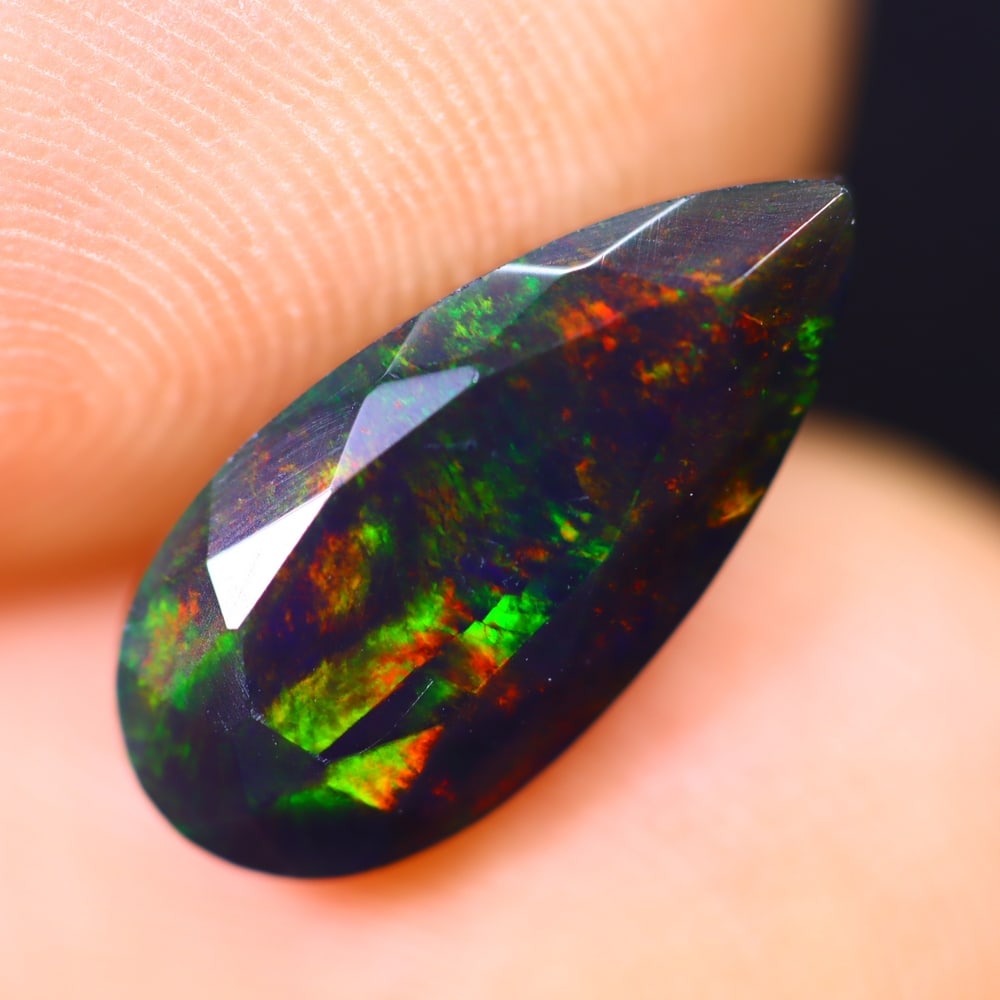 1.78Ct Welo Black Opal Polished - Ethiopian Opal - Pear Faceted: Ksmith Jewels Global Welcome to our auction house, today auction brought to you by Ksmith Jewels Global based in Penang, Malaysia specialize in all kinds of opal and color gemstone both in manufacturi