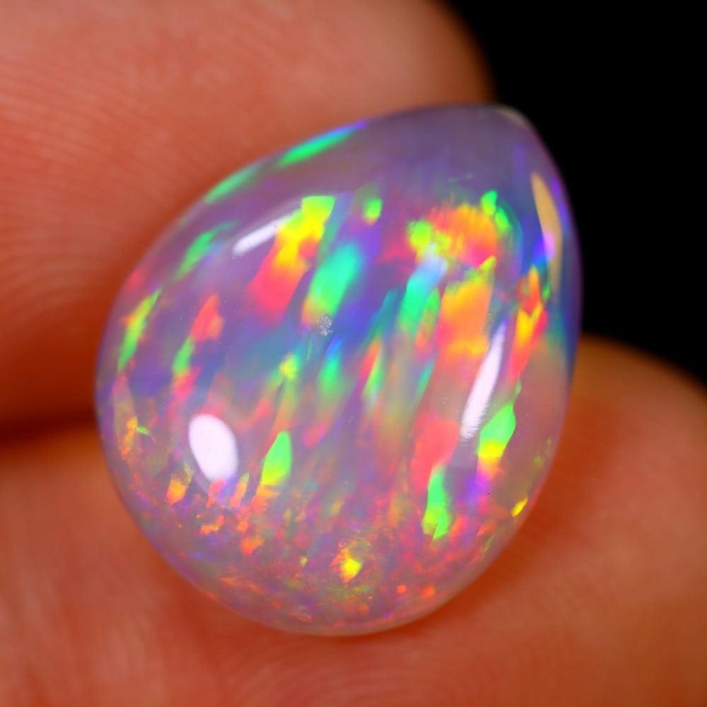 5Ct Welo Opal Polished - Ethiopian Opal - Pear Cabochon: Ksmith Jewels Global Welcome to our auction house, today auction brought to you by Ksmith Jewels Global based in Penang, Malaysia specialize in all kinds of opal and color gemstone both in manufacturi