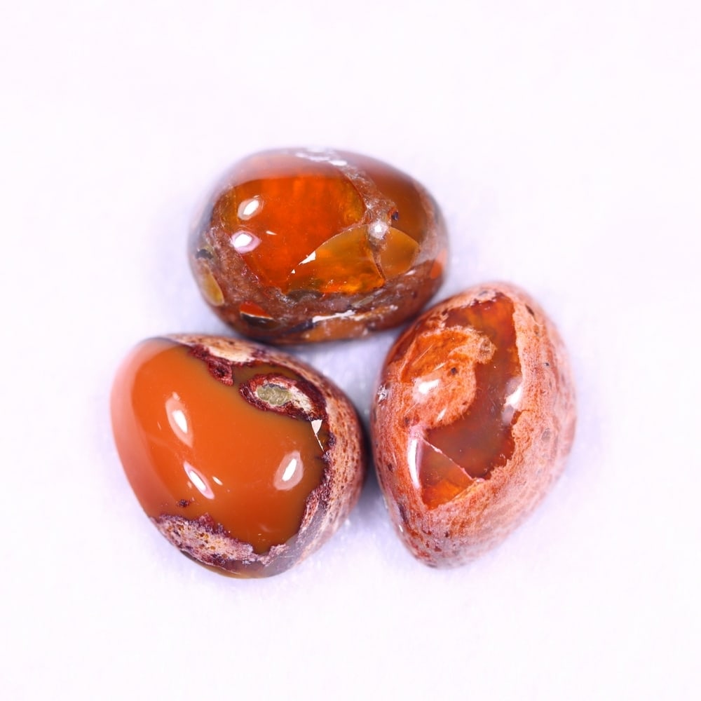 15.92Ct Group of 3 Mexican Fire Opal - Mexican Opal - Cabochon: Ksmith Jewels Global Welcome to our auction house, today auction brought to you by Ksmith Jewels Global based in Penang, Malaysia specialize in all kinds of opal and color gemstone both in manufacturi