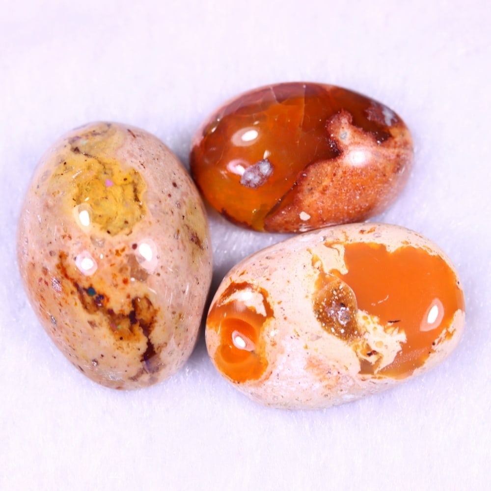 30.16Ct Group of 3 Mexican Fire Opal - Mexican Opal - Cabochon: Ksmith Jewels Global Welcome to our auction house, today auction brought to you by Ksmith Jewels Global based in Penang, Malaysia specialize in all kinds of opal and color gemstone both in manufacturi