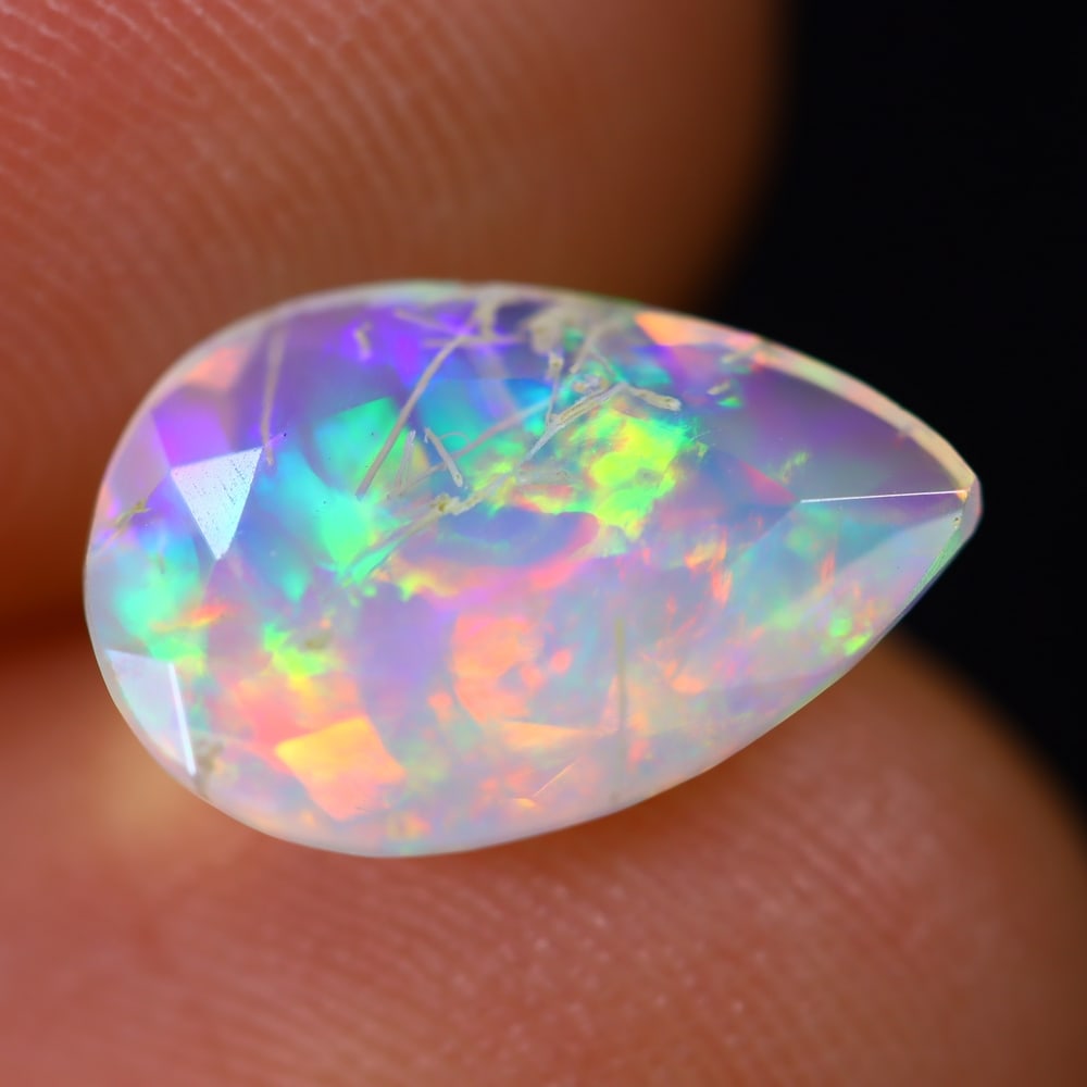 1.66Ct Welo Opal Polished - Ethiopian Opal - Pear Faceted: Ksmith Jewels Global Welcome to our auction house, today auction brought to you by Ksmith Jewels Global based in Penang, Malaysia specialize in all kinds of opal and color gemstone both in manufacturi