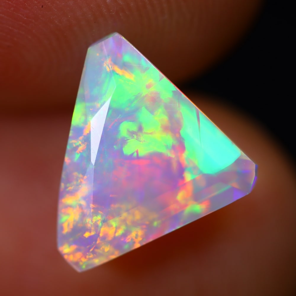 1.78Ct Welo Opal Polished - Ethiopian Opal - Triangle Faceted: Ksmith Jewels Global Welcome to our auction house, today auction brought to you by Ksmith Jewels Global based in Penang, Malaysia specialize in all kinds of opal and color gemstone both in manufacturi