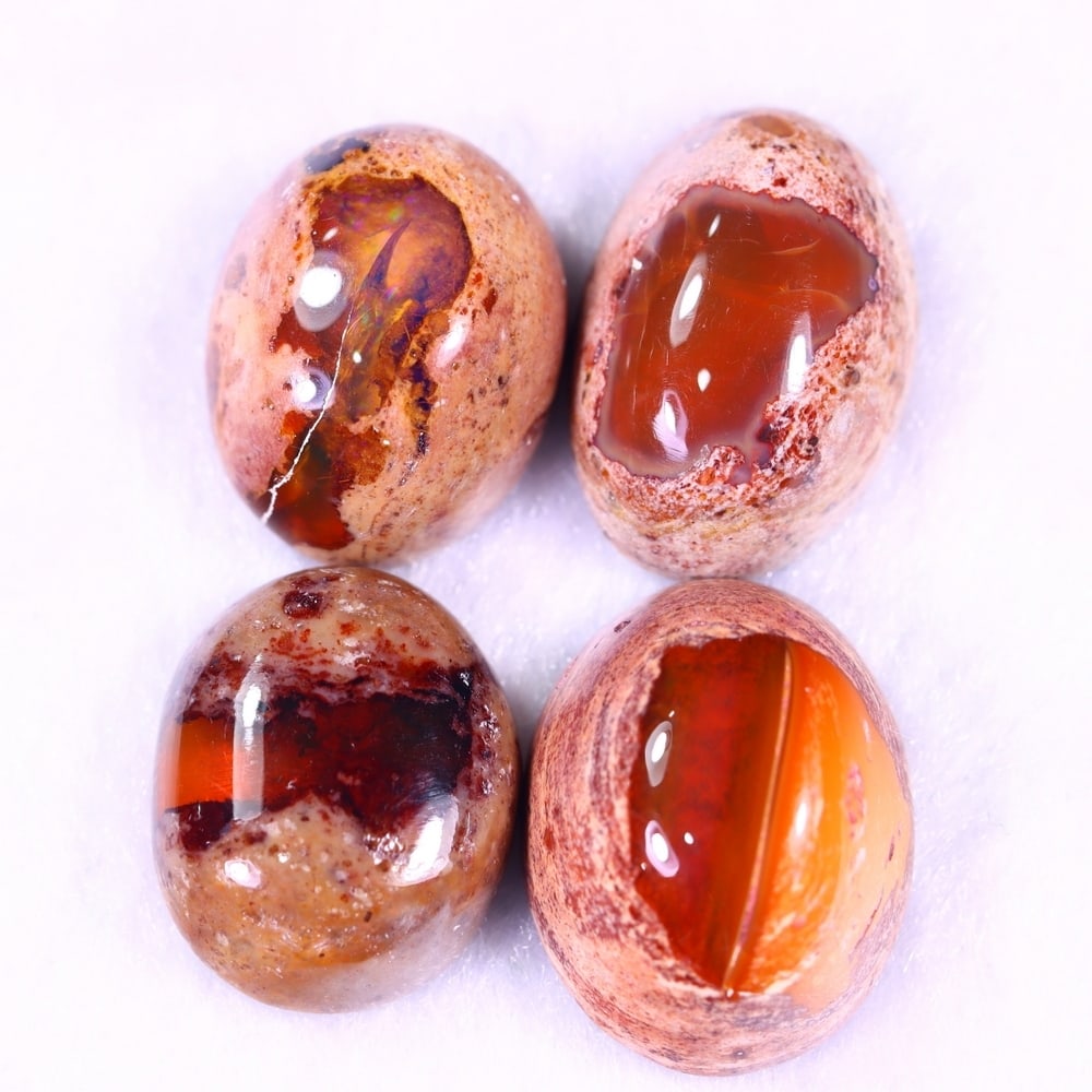 34.83Ct Group of 4 Mexican Fire Opal - Mexican Opal - Cabochon: Ksmith Jewels Global Welcome to our auction house, today auction brought to you by Ksmith Jewels Global based in Penang, Malaysia specialize in all kinds of opal and color gemstone both in manufacturi