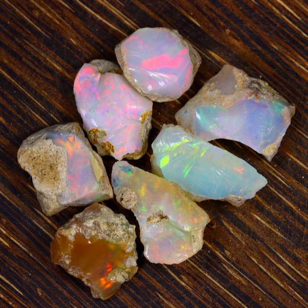 39Ct Group of 7 Rough Opal Specimen - Ethiopian Opal - Mineral Rough Set: Ksmith Jewels Global Welcome to our auction house, today auction brought to you by Ksmith Jewels Global based in Penang, Malaysia specialize in all kinds of opal and color gemstone both in manufacturi