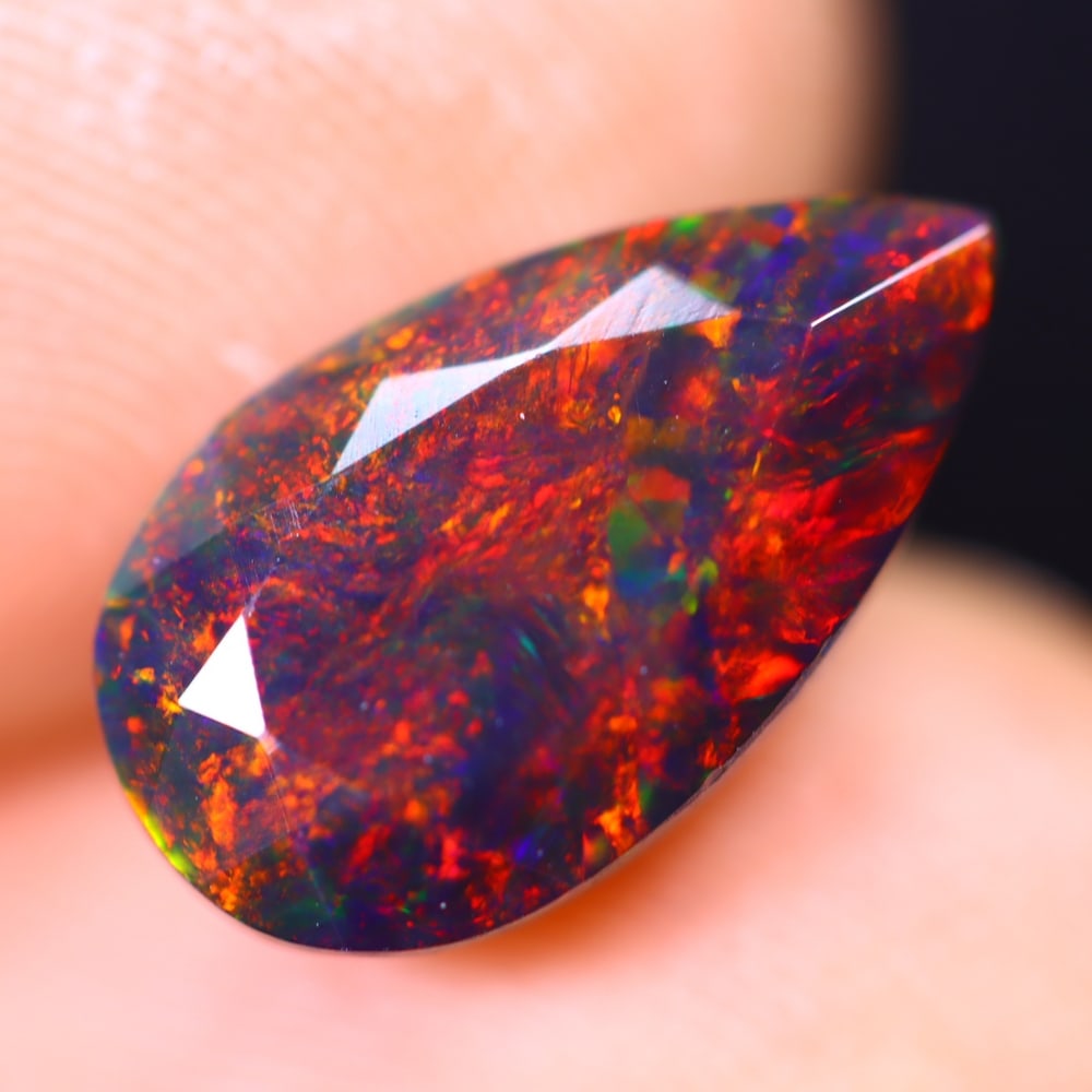 2.46Ct Welo Black Opal Polished - Ethiopian Opal - Pear Faceted: Ksmith Jewels Global Welcome to our auction house, today auction brought to you by Ksmith Jewels Global based in Penang, Malaysia specialize in all kinds of opal and color gemstone both in manufacturi