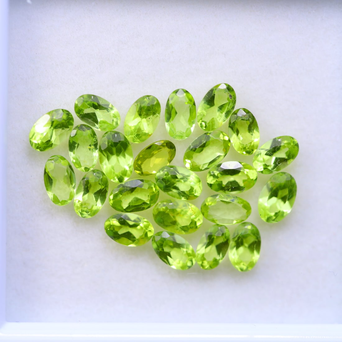 Peridot 6.23Ct Natural Oval Cut Pakistan Green Peridot (OT6579): Ksmith Jewels Global Welcome to our auction house, today auction brought to you by Ksmith Jewels Global based in Penang, Malaysia specialize in all kinds of opal and color gemstone both in manufacturi