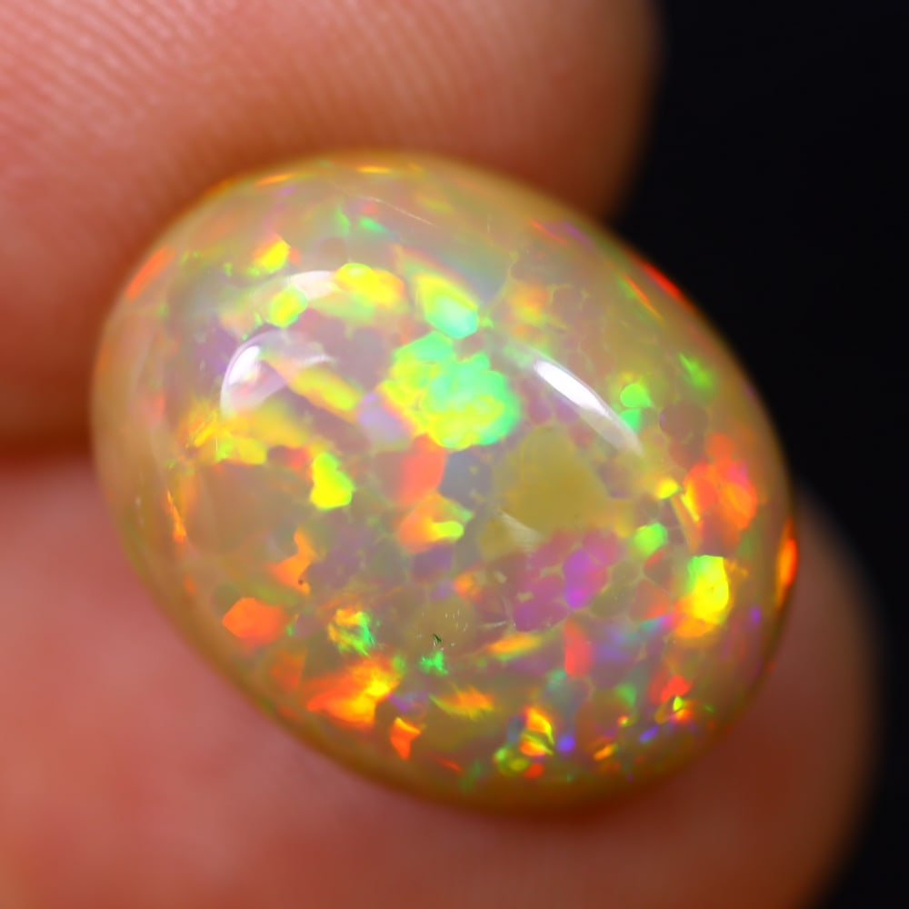4.65Ct Welo Opal Polished - Ethiopian Opal - Oval Cabochon: Ksmith Jewels Global Welcome to our auction house, today auction brought to you by Ksmith Jewels Global based in Penang, Malaysia specialize in all kinds of opal and color gemstone both in manufacturi