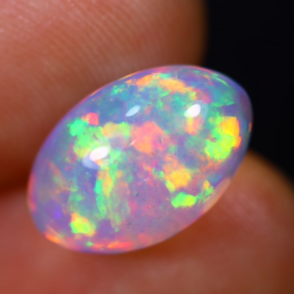 3.94Ct Welo Opal Polished - Ethiopian Opal - Oval Cabochon: Ksmith Jewels Global Welcome to our auction house, today auction brought to you by Ksmith Jewels Global based in Penang, Malaysia specialize in all kinds of opal and color gemstone both in manufacturi