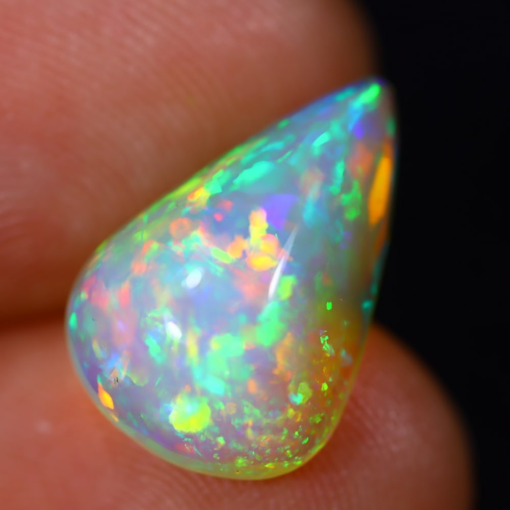 3.90Ct Welo Opal Polished - Ethiopian Opal - Pear Cabochon: Ksmith Jewels Global Welcome to our auction house, today auction brought to you by Ksmith Jewels Global based in Penang, Malaysia specialize in all kinds of opal and color gemstone both in manufacturi