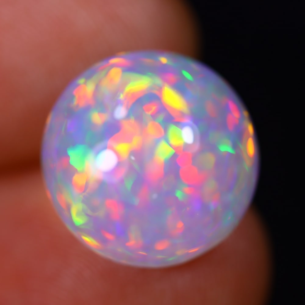 6.08Ct Welo Opal Polished - Ethiopian Opal - Round Cabochon: Ksmith Jewels Global Welcome to our auction house, today auction brought to you by Ksmith Jewels Global based in Penang, Malaysia specialize in all kinds of opal and color gemstone both in manufacturi