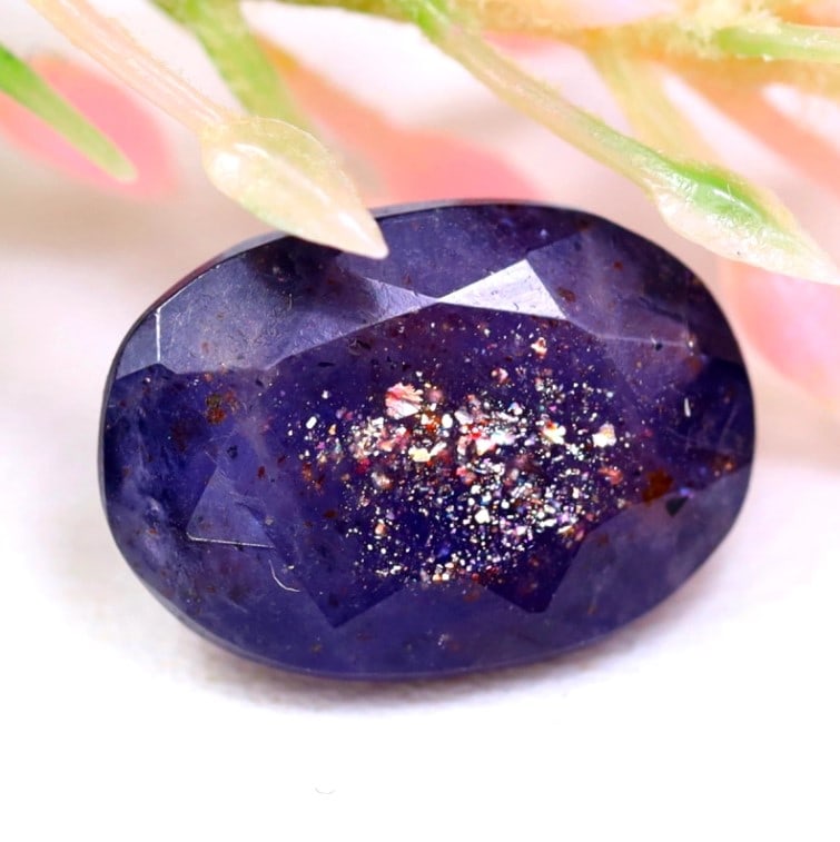 3.88Ct Natural Bloodshot Iolite Sunstone - India Gemstone - Oval Faceted: Ksmith Jewels Global Welcome to our auction house, today auction brought to you by Ksmith Jewels Global based in Penang, Malaysia specialize in all kinds of opal and color gemstone both in manufacturi