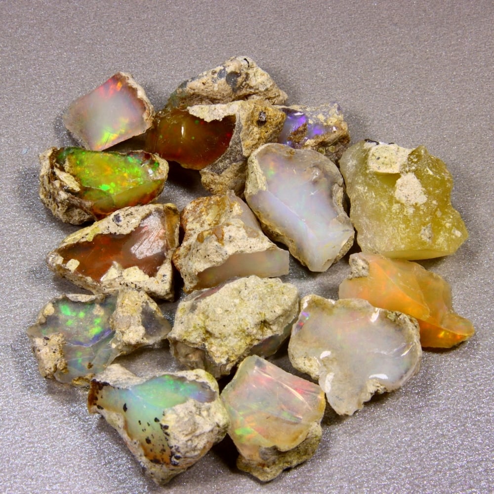 100Ct Rough Opal Specimen - Ethiopian Opal - Mineral Rough Set: Ksmith Jewels Global Welcome to our auction house, today auction brought to you by Ksmith Jewels Global based in Penang, Malaysia specialize in all kinds of opal and color gemstone both in manufacturi