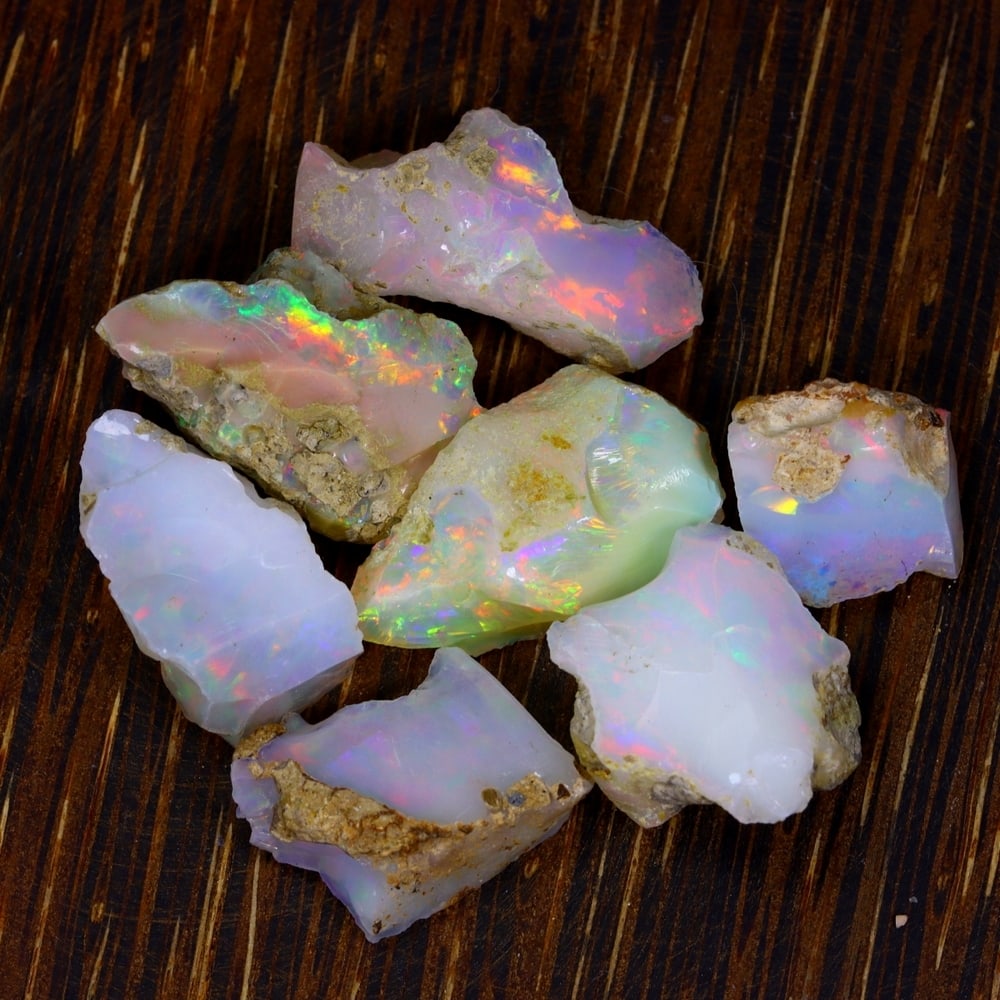 55Ct Group of 7 Rough Opal Specimen - Ethiopian Opal - Mineral Rough Set: Ksmith Jewels Global Welcome to our auction house, today auction brought to you by Ksmith Jewels Global based in Penang, Malaysia specialize in all kinds of opal and color gemstone both in manufacturi