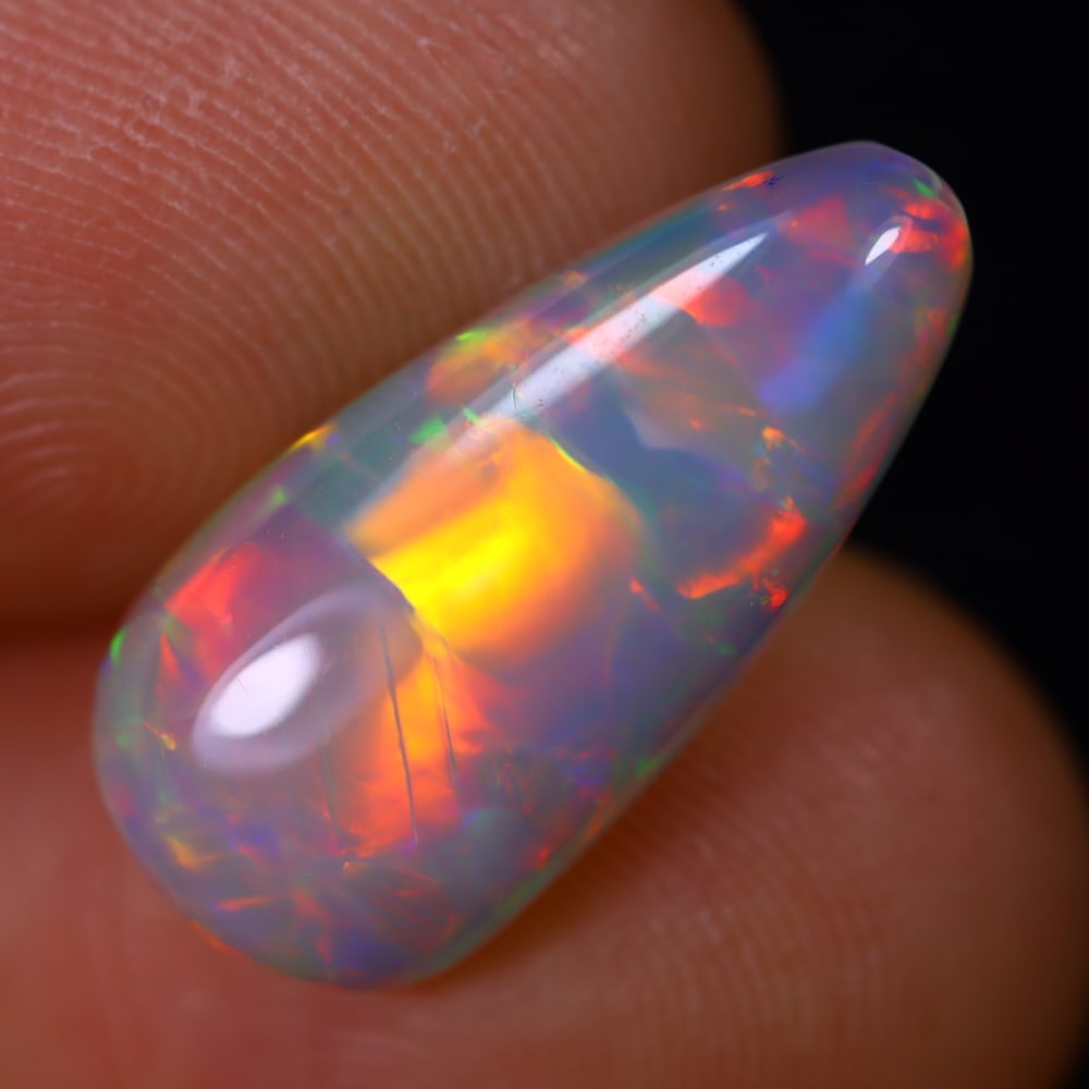 4.49Ct Welo Opal Polished - Ethiopian Opal - Pear Cabochon: Ksmith Jewels Global Welcome to our auction house, today auction brought to you by Ksmith Jewels Global based in Penang, Malaysia specialize in all kinds of opal and color gemstone both in manufacturi