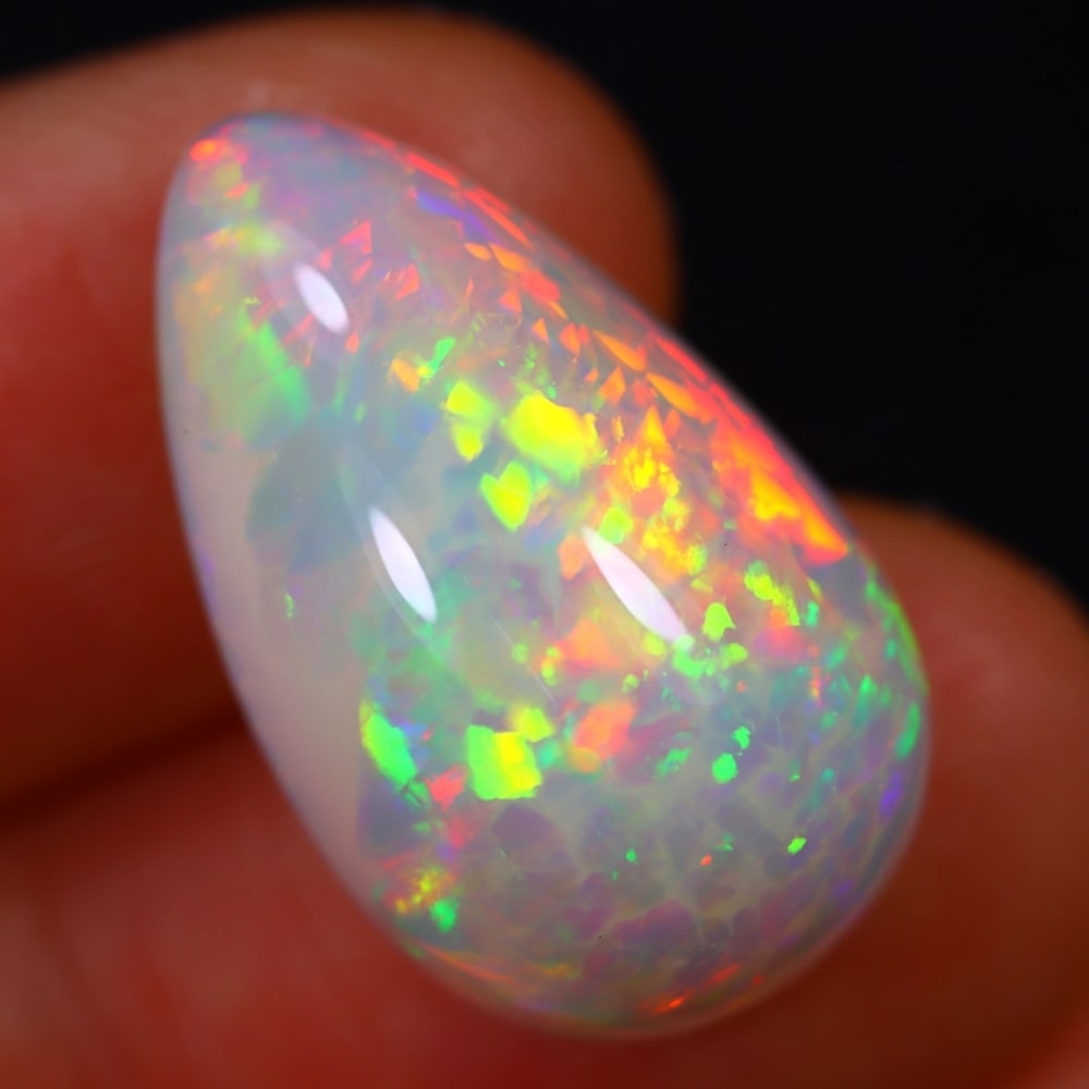 12.19Ct Welo Opal Polished - Ethiopian Opal - Pear Cabochon: Ksmith Jewels Global Welcome to our auction house, today auction brought to you by Ksmith Jewels Global based in Penang, Malaysia specialize in all kinds of opal and color gemstone both in manufacturi