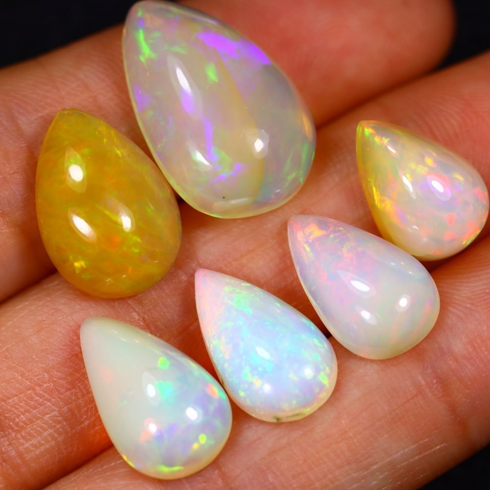 26.97Ct Group of 6 Welo Opal Polished - Ethiopian Opal: Ksmith Jewels Global Welcome to our auction house, today auction brought to you by Ksmith Jewels Global based in Penang, Malaysia specialize in all kinds of opal and color gemstone both in manufacturi