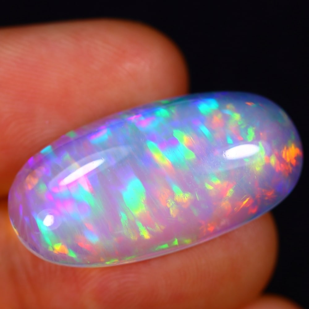 15.44Ct Welo Opal Polished - Ethiopian Opal - Oval Cabochon: Ksmith Jewels Global Welcome to our auction house, today auction brought to you by Ksmith Jewels Global based in Penang, Malaysia specialize in all kinds of opal and color gemstone both in manufacturi