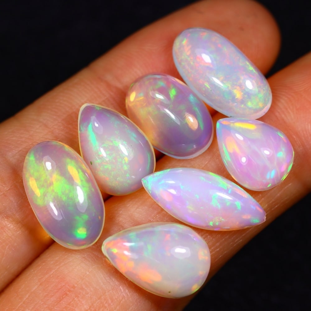 18.17Ct Group of 7 Welo Opal Polished - Ethiopian Opal: Ksmith Jewels Global Welcome to our auction house, today auction brought to you by Ksmith Jewels Global based in Penang, Malaysia specialize in all kinds of opal and color gemstone both in manufacturi