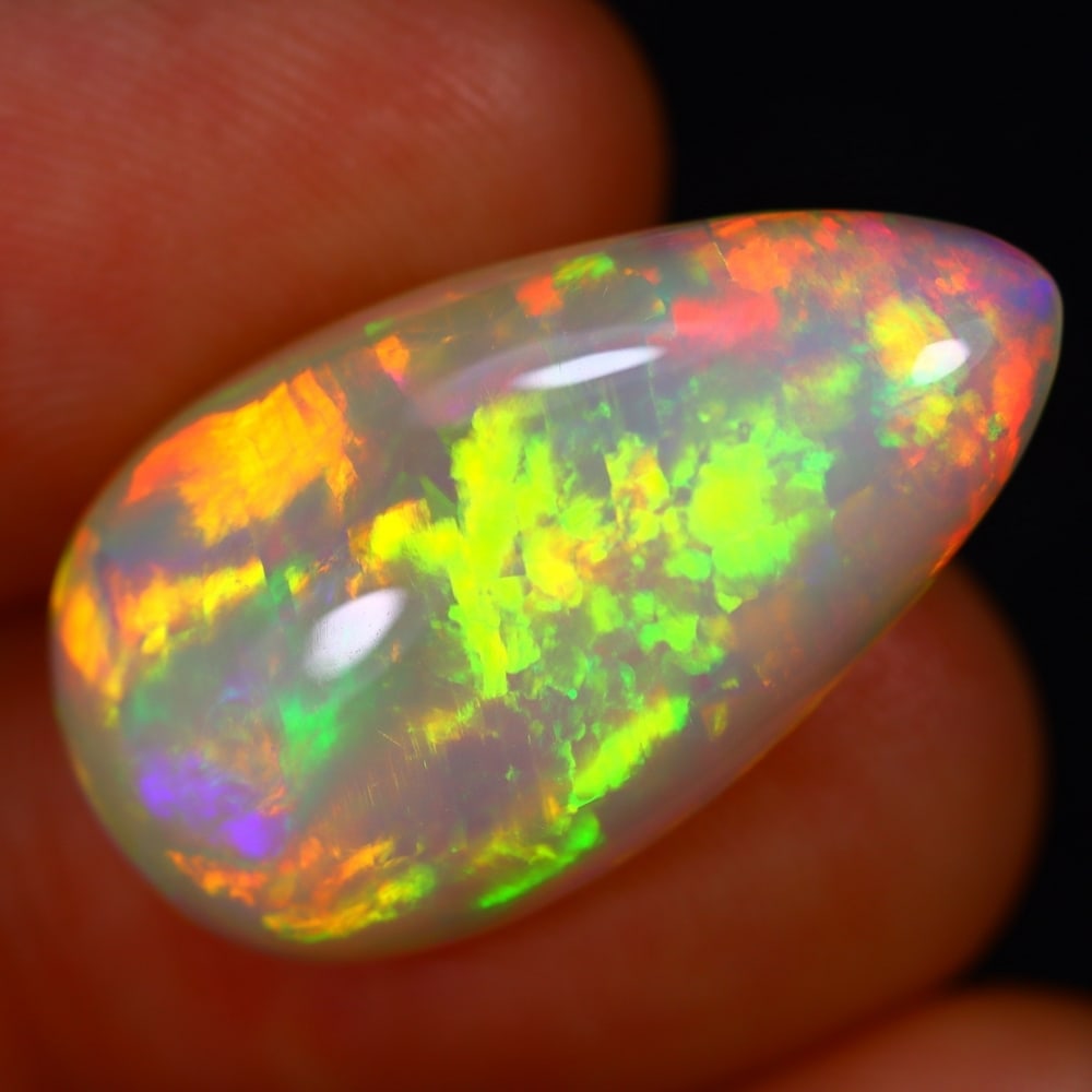 12.20Ct Welo Opal Polished - Ethiopian Opal - Pear Cabochon: Ksmith Jewels Global Welcome to our auction house, today auction brought to you by Ksmith Jewels Global based in Penang, Malaysia specialize in all kinds of opal and color gemstone both in manufacturi