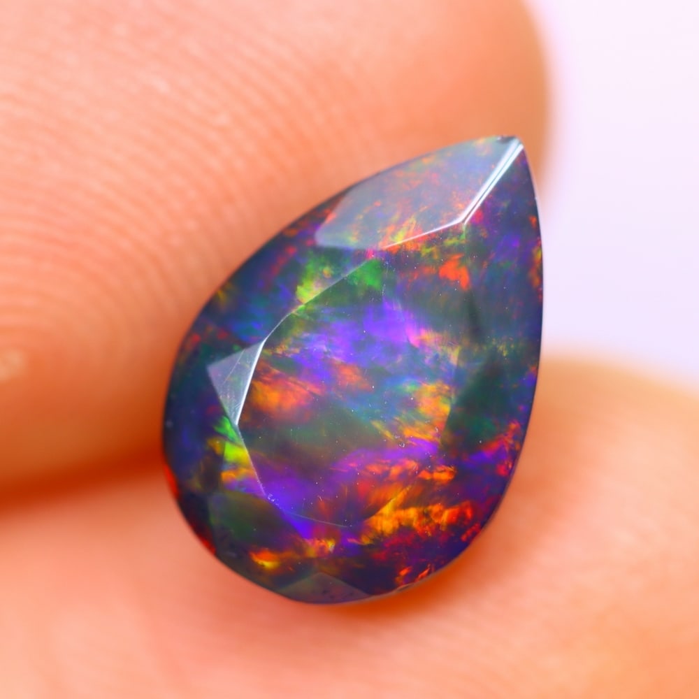 1.79Ct Welo Black Opal Polished - Ethiopian Opal - Pear Faceted: Ksmith Jewels Global Welcome to our auction house, today auction brought to you by Ksmith Jewels Global based in Penang, Malaysia specialize in all kinds of opal and color gemstone both in manufacturi