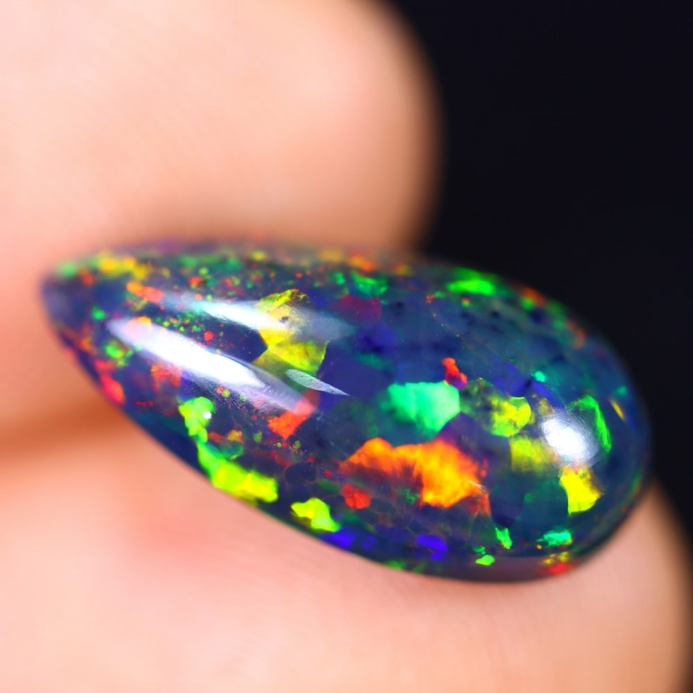 3.81Ct Welo Black Opal Polished - Ethiopian Opal - Pear Cabochon: Ksmith Jewels Global Welcome to our auction house, today auction brought to you by Ksmith Jewels Global based in Penang, Malaysia specialize in all kinds of opal and color gemstone both in manufacturi