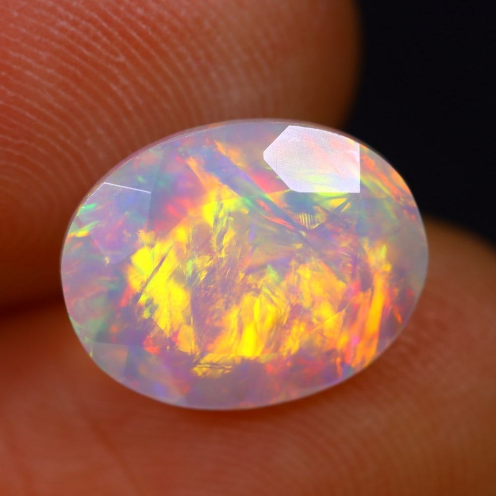 2.03Ct Welo Opal Polished - Ethiopian Opal - Oval Faceted: Ksmith Jewels Global Welcome to our auction house, today auction brought to you by Ksmith Jewels Global based in Penang, Malaysia specialize in all kinds of opal and color gemstone both in manufacturi