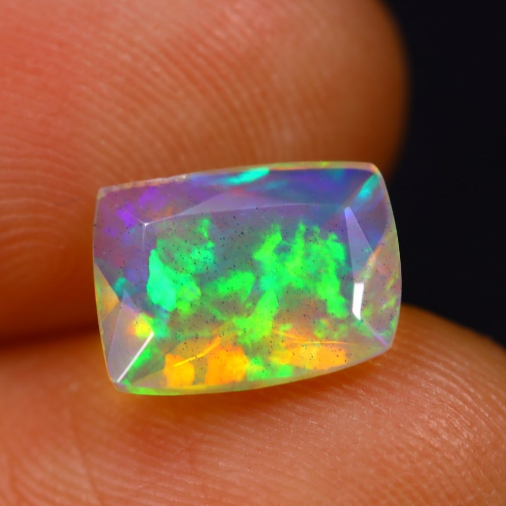 1.58Ct Welo Opal Polished - Ethiopian Opal - Rectangle Faceted: Ksmith Jewels Global Welcome to our auction house, today auction brought to you by Ksmith Jewels Global based in Penang, Malaysia specialize in all kinds of opal and color gemstone both in manufacturi