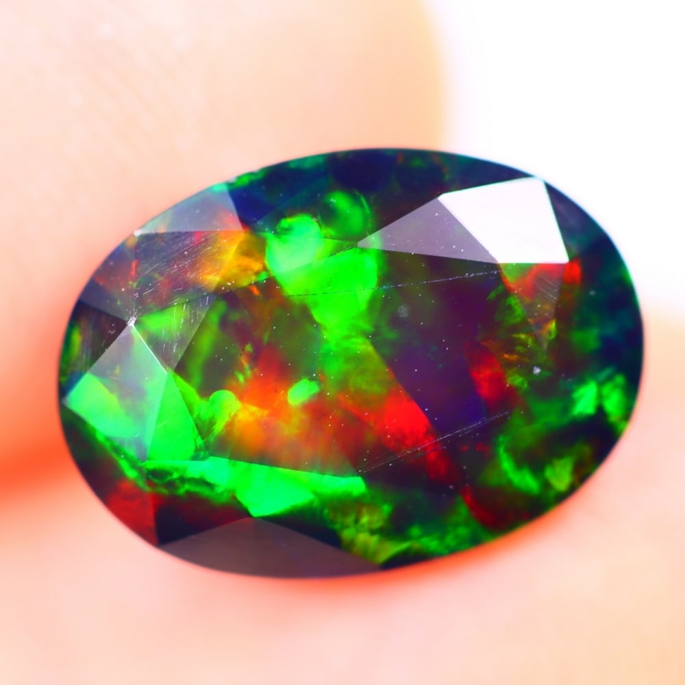 2.43Ct Welo Black Opal Polished - Ethiopian Opal - Oval Faceted: Ksmith Jewels Global Welcome to our auction house, today auction brought to you by Ksmith Jewels Global based in Penang, Malaysia specialize in all kinds of opal and color gemstone both in manufacturi