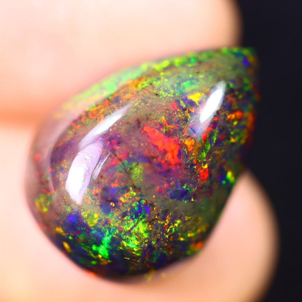 9.08Ct Welo Black Opal Polished - Ethiopian Opal - Pear Cabochon: Ksmith Jewels Global Welcome to our auction house, today auction brought to you by Ksmith Jewels Global based in Penang, Malaysia specialize in all kinds of opal and color gemstone both in manufacturi