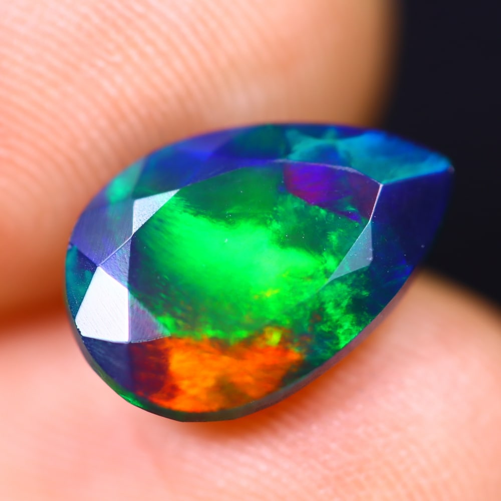 2.06Ct Welo Black Opal Polished - Ethiopian Opal - Pear Faceted: Ksmith Jewels Global Welcome to our auction house, today auction brought to you by Ksmith Jewels Global based in Penang, Malaysia specialize in all kinds of opal and color gemstone both in manufacturi