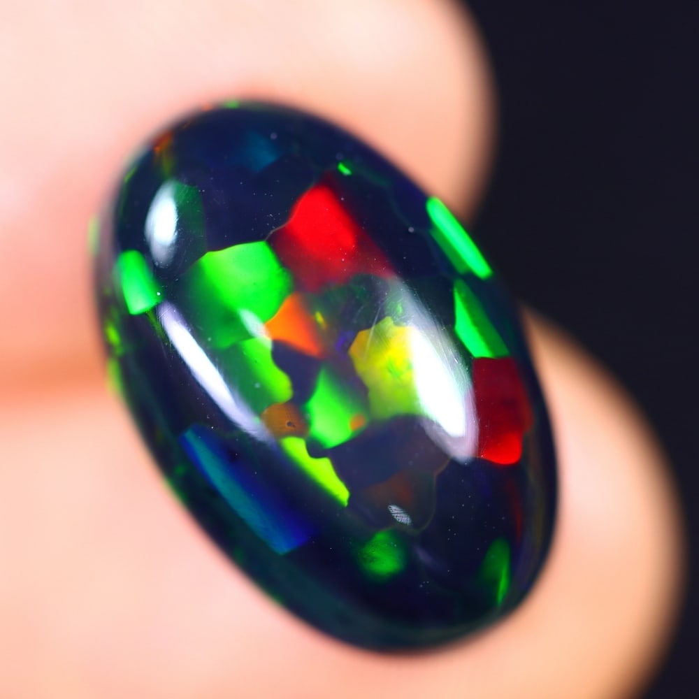 6.47Ct Welo Black Opal Polished - Ethiopian Opal - Oval Cabochon: Ksmith Jewels Global Welcome to our auction house, today auction brought to you by Ksmith Jewels Global based in Penang, Malaysia specialize in all kinds of opal and color gemstone both in manufacturi