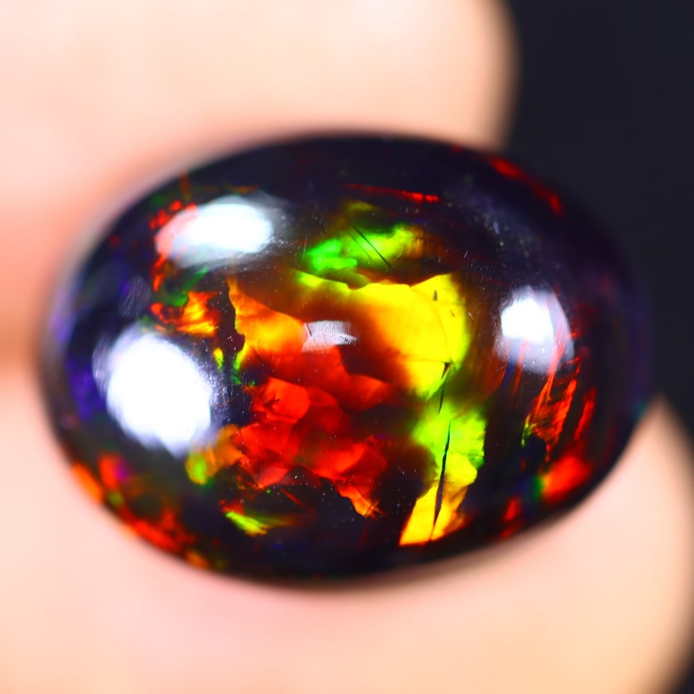 10.20Ct Welo Black Opal Polished - Ethiopian Opal - Oval Cabochon: Ksmith Jewels Global Welcome to our auction house, today auction brought to you by Ksmith Jewels Global based in Penang, Malaysia specialize in all kinds of opal and color gemstone both in manufacturi