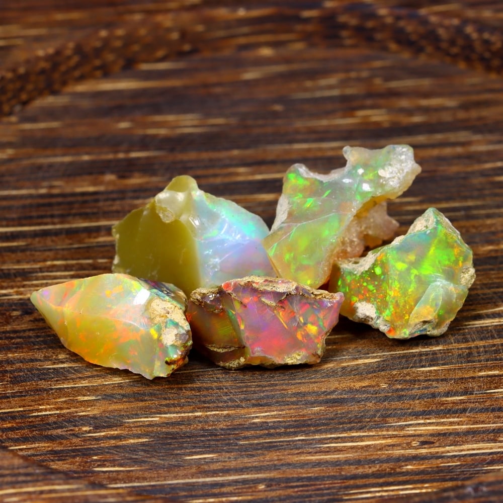 40Ct Group of 5 Rough Opal Specimen - Ethiopian Opal - Mineral Rough Set: Ksmith Jewels Global Welcome to our auction house, today auction brought to you by Ksmith Jewels Global based in Penang, Malaysia specialize in all kinds of opal and color gemstone both in manufacturi