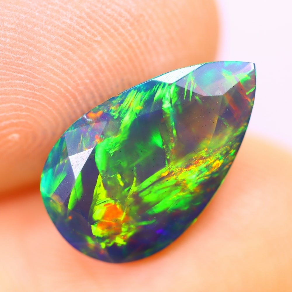2.28Ct Welo Black Opal Polished - Ethiopian Opal - Pear Faceted: Ksmith Jewels Global Welcome to our auction house, today auction brought to you by Ksmith Jewels Global based in Penang, Malaysia specialize in all kinds of opal and color gemstone both in manufacturi