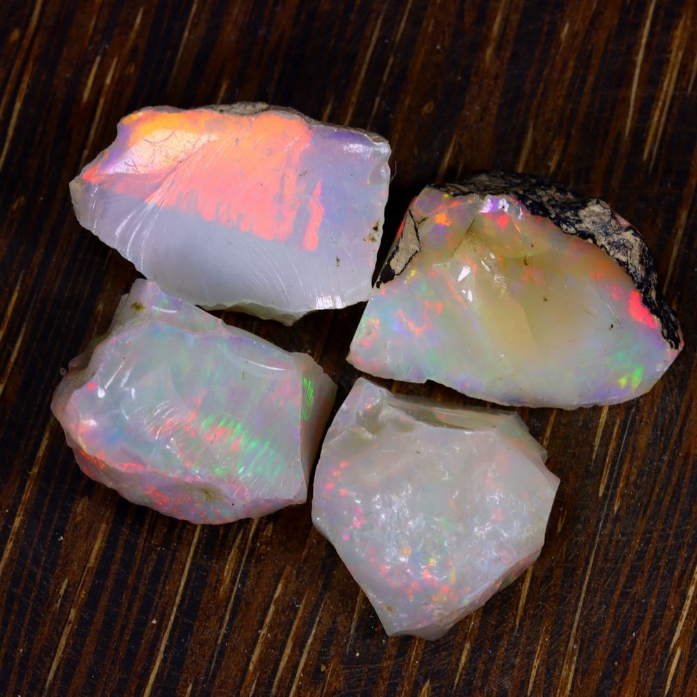 61Ct Group of 4 Rough Opal Specimen - Ethiopian Opal - Mineral Rough Set: Ksmith Jewels Global Welcome to our auction house, today auction brought to you by Ksmith Jewels Global based in Penang, Malaysia specialize in all kinds of opal and color gemstone both in manufacturi