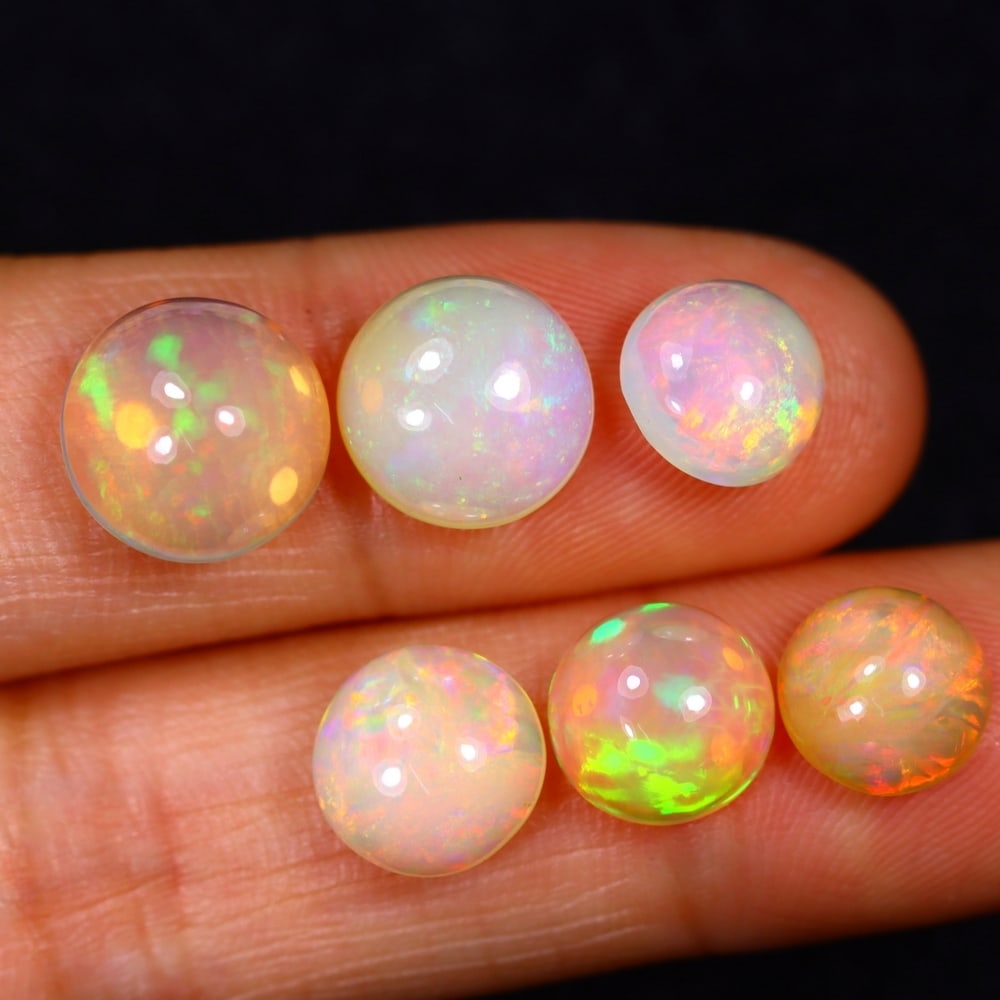 10.87Ct Group of 6 Welo Opal Polished - Ethiopian Opal: Ksmith Jewels Global Welcome to our auction house, today auction brought to you by Ksmith Jewels Global based in Penang, Malaysia specialize in all kinds of opal and color gemstone both in manufacturi