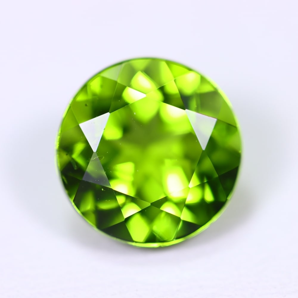 3.95Ct Peridot - Polished Faceted - Round Faceted: Ksmith Jewels Global Welcome to our auction house, today auction brought to you by Ksmith Jewels Global based in Penang, Malaysia specialize in all kinds of opal and color gemstone both in manufacturi