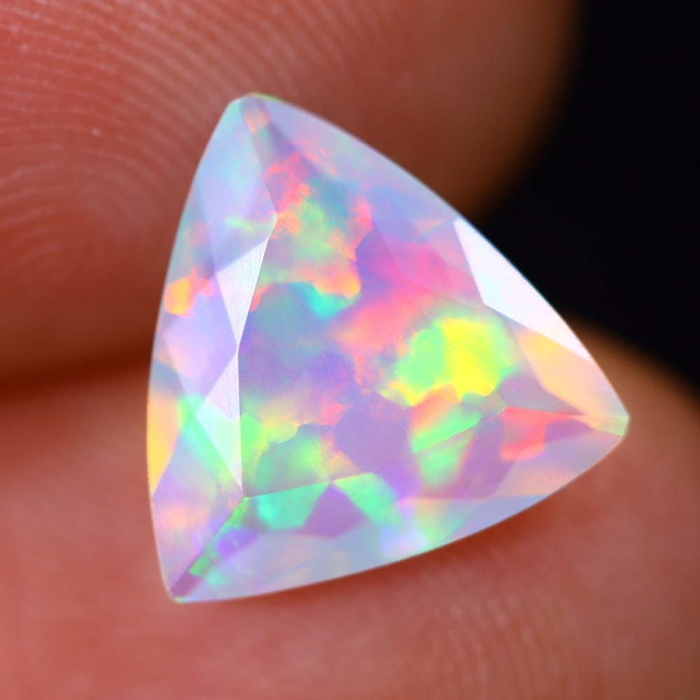 1.69Ct Welo Opal Polished - Ethiopian Opal - Triangle Faceted: Ksmith Jewels Global Welcome to our auction house, today auction brought to you by Ksmith Jewels Global based in Penang, Malaysia specialize in all kinds of opal and color gemstone both in manufacturi