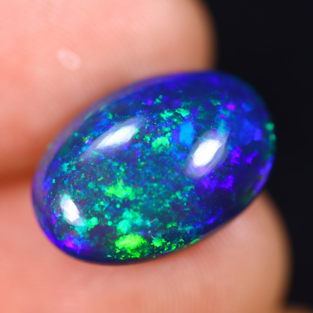 5.34Ct Welo Black Opal Polished - Ethiopian Opal - Oval Cabochon: Ksmith Jewels Global Welcome to our auction house, today auction brought to you by Ksmith Jewels Global based in Penang, Malaysia specialize in all kinds of opal and color gemstone both in manufacturi