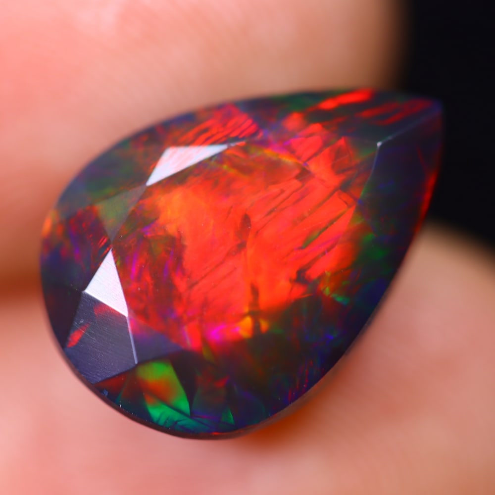 4.55Ct Welo Black Opal Polished - Ethiopian Opal - Pear Faceted: Ksmith Jewels Global Welcome to our auction house, today auction brought to you by Ksmith Jewels Global based in Penang, Malaysia specialize in all kinds of opal and color gemstone both in manufacturi