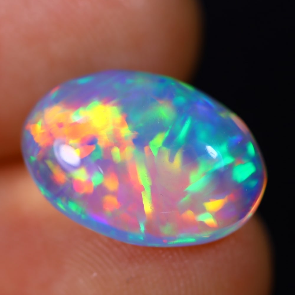 4.06Ct Welo Opal Polished - Ethiopian Opal - Oval Cabochon: Ksmith Jewels Global Welcome to our auction house, today auction brought to you by Ksmith Jewels Global based in Penang, Malaysia specialize in all kinds of opal and color gemstone both in manufacturi