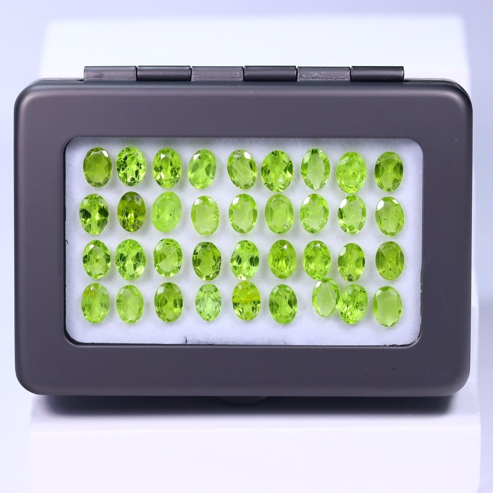 28.01Ct Peridot Lot - Polished Faceted - Oval Faceted: Ksmith Jewels Global Welcome to our auction house, today auction brought to you by Ksmith Jewels Global based in Penang, Malaysia specialize in all kinds of opal and color gemstone both in manufacturi