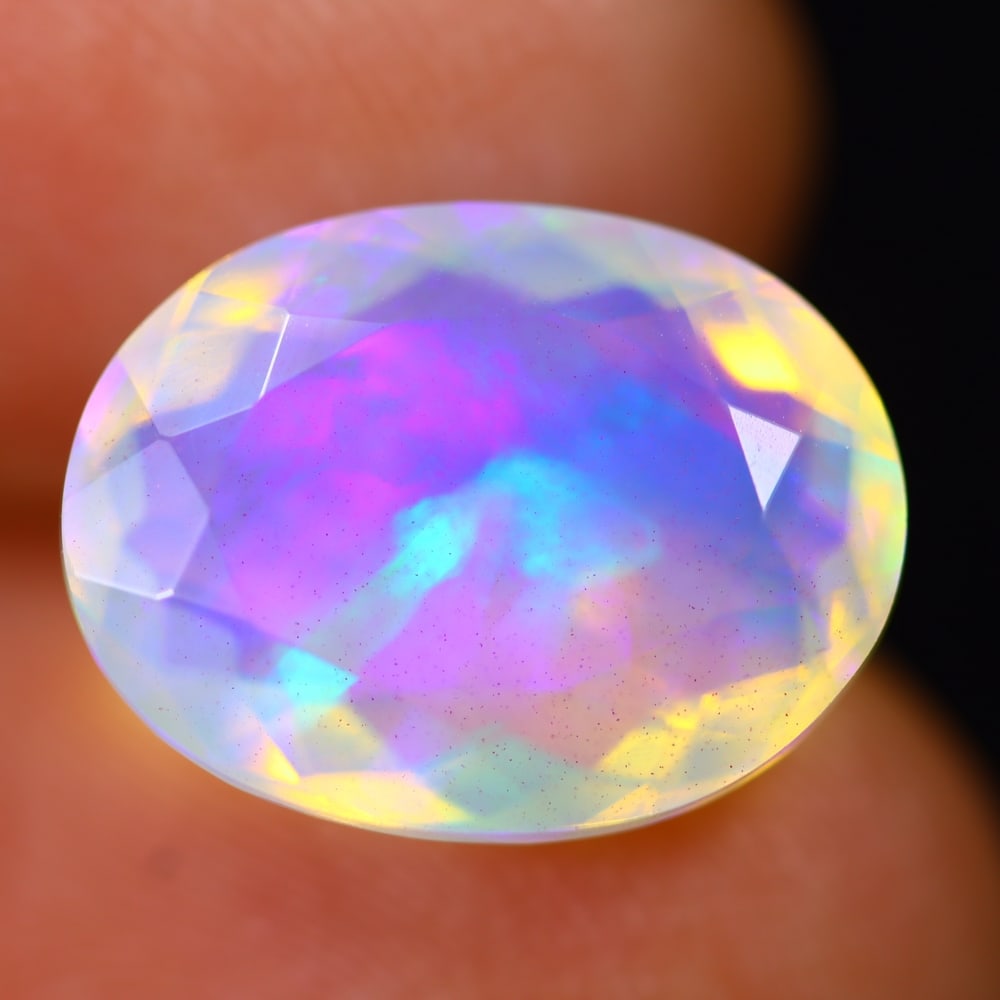 4.87Ct Welo Opal Polished - Ethiopian Opal - Oval Faceted: Ksmith Jewels Global Welcome to our auction house, today auction brought to you by Ksmith Jewels Global based in Penang, Malaysia specialize in all kinds of opal and color gemstone both in manufacturi