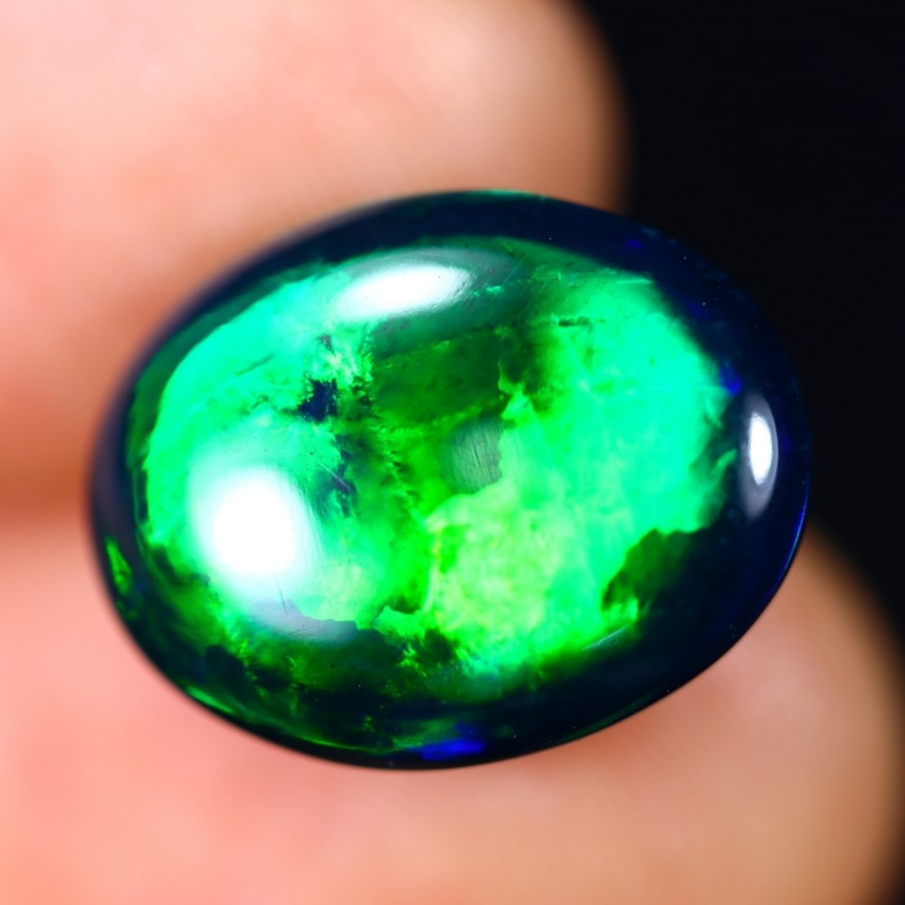 6.10Ct Welo Black Opal Polished - Ethiopian Opal - Oval Cabochon: Ksmith Jewels Global Welcome to our auction house, today auction brought to you by Ksmith Jewels Global based in Penang, Malaysia specialize in all kinds of opal and color gemstone both in manufacturi