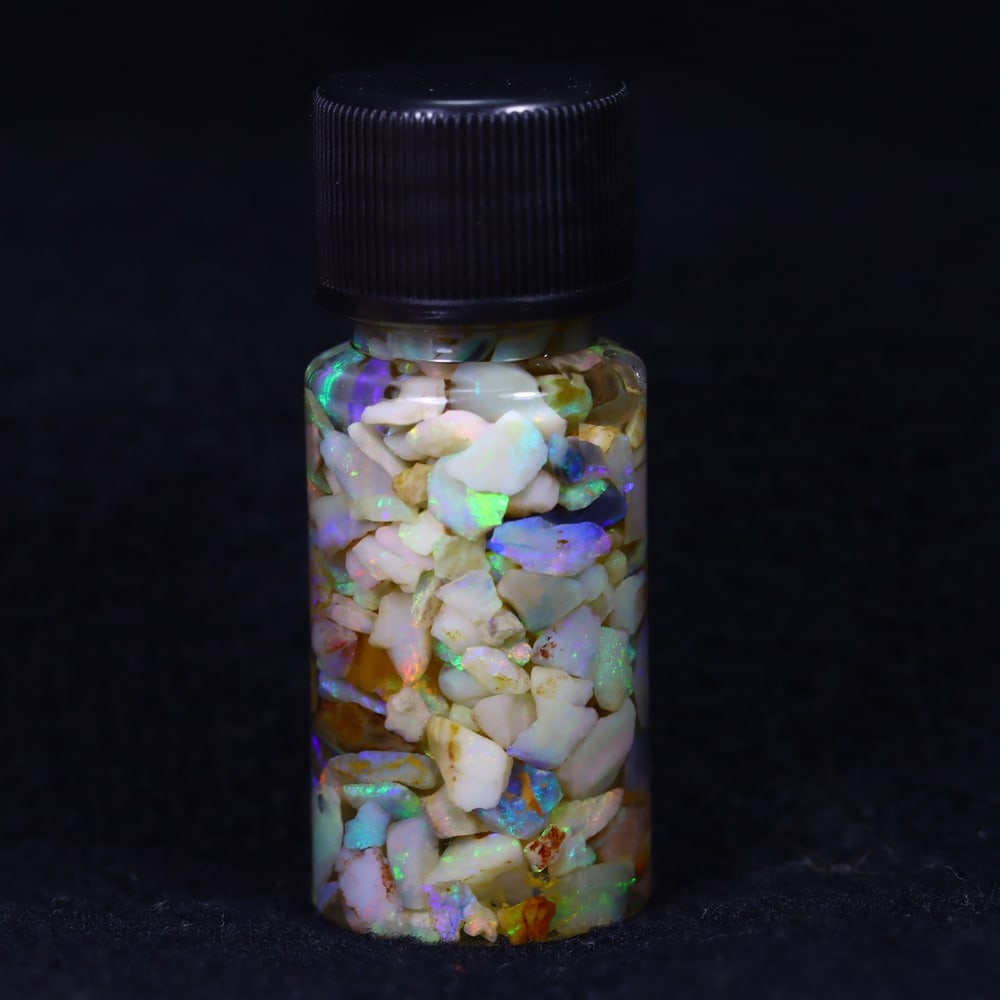 Australian Lightning Ridge Crystal Black Opal Rough Chip Jar (Good For Display): Ksmith Jewels Global Welcome to our auction house, today auction brought to you by Ksmith Jewels Global based in Penang, Malaysia specialize in all kinds of opal and color gemstone both in manufacturi